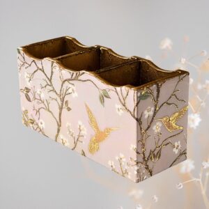 Pink Wing handcrafted wooden cutlery holder with three pockets, blush pink base, and golden bird design